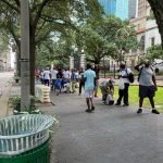 homeless people, lining up for food 