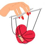 Heart on manipulative strings in woman hand
