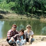 Photo of Dave, Rocky and me in front of a lake in the Texas Hill Country.